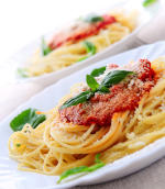 Stock photograph, not taken at the meeting Spaghetti with a pesto sauce
