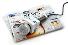Read all about it! A newspaper and a microphone